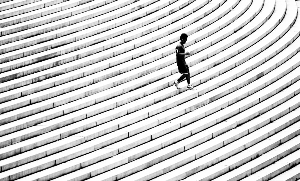 Jogger at Margaret Bourke-White steps. Lincoln Memorial. Washington DC.